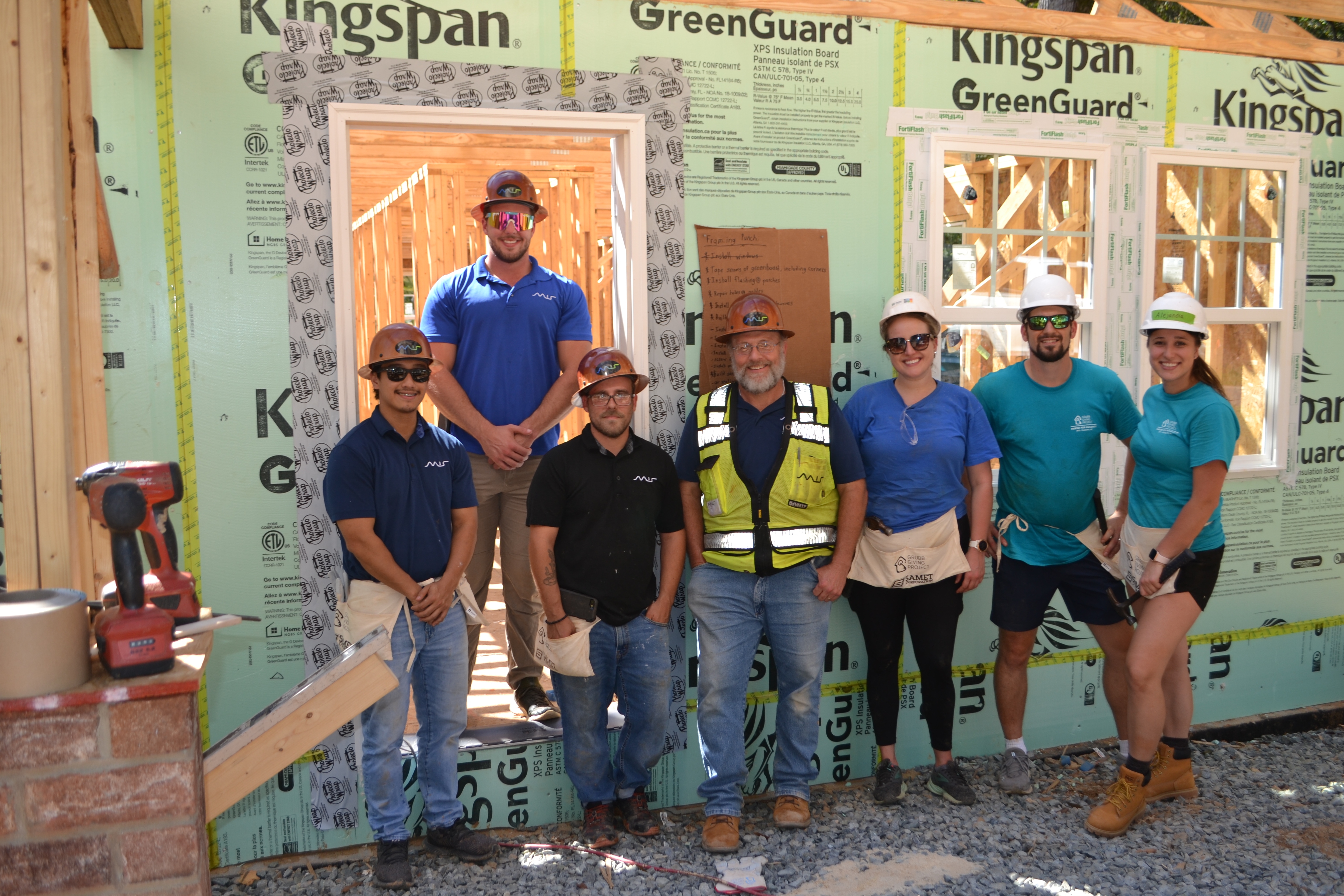 group photo on habitat build day grubb giving