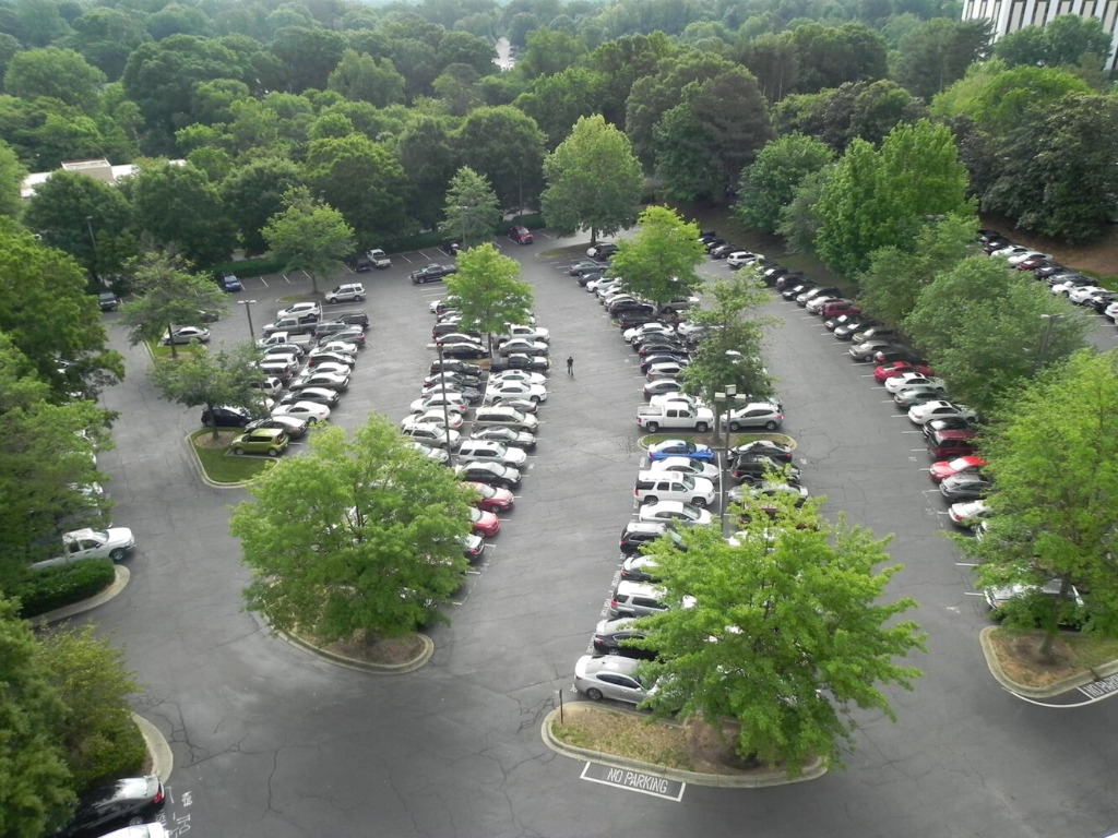 Two existing office buildings and surface parking lot in Montford Park